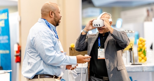 Man wearing a VR headset at a trade show