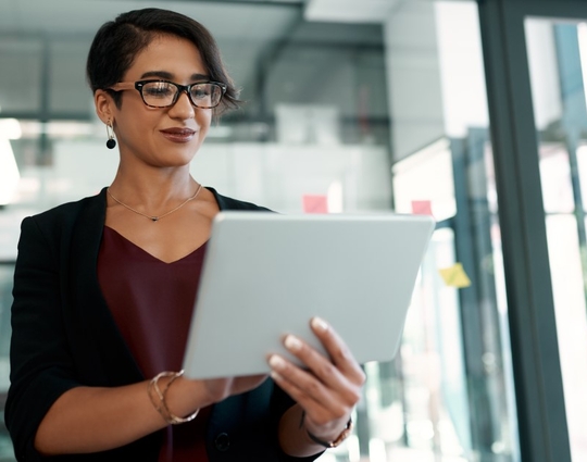 Business woman holding a tablet 