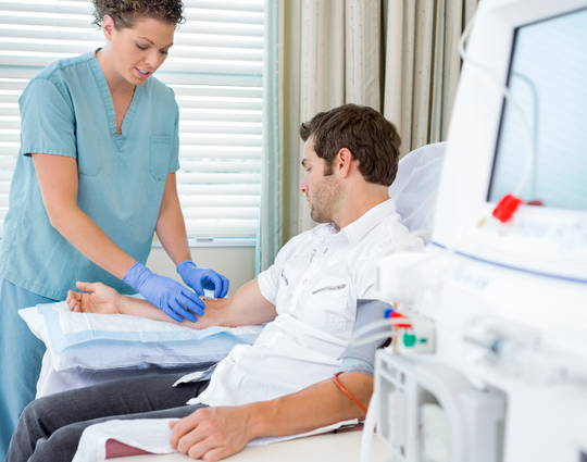 man getting dialysis