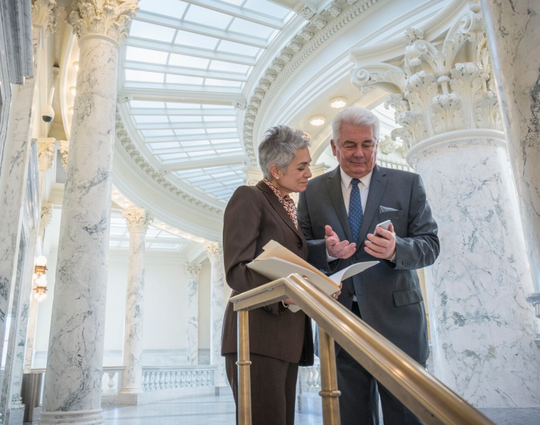 Two law makers in government building